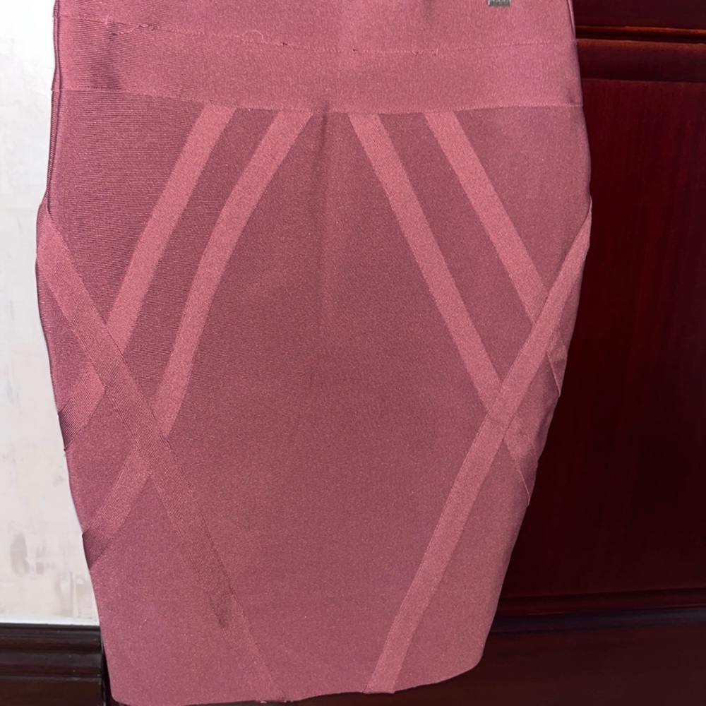 Bandge pencil skirt with design. Very flattering and sexy.